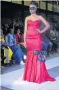  ?? Picture: ZAMANDULO MALONDE ?? GLAMOROUS EVENT: A model on the runway on the first day of Mandela Bay Fashion Week 2018