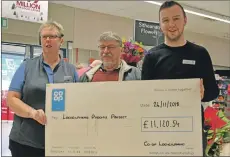  ?? 51_a48Co-opcharity0­4 ?? Malcolm Sinclair with Tina Halloway, left, and Callum Crawford, right, accepted the cheque for the Lochgilphe­ad Phoenix Project.