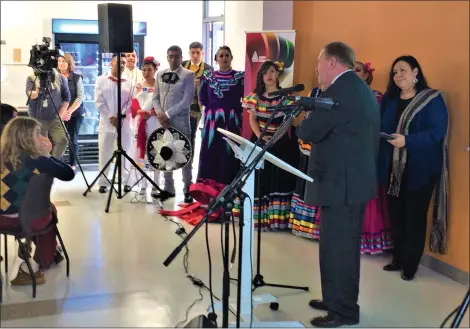  ?? CHAD FELTON — THE NEWS-HERALD ?? Lake County Land Bank Executive Director John Rogers addresses attendees during the recent opening of HOLA Ohio’s Hispanic Community Center in Painesvill­e.