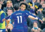  ?? GETTY ?? Chelsea's Willian celebrates the second goal with Pedro.