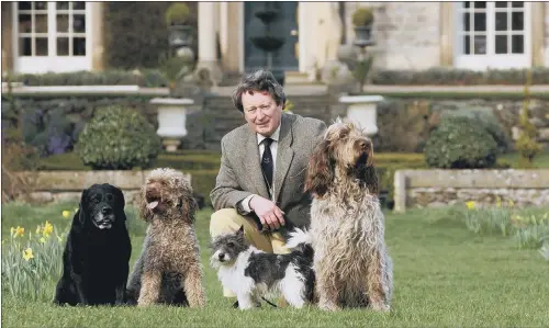  ?? PICTURE: GERARD BINKS ?? MOORLAND ENTHUSIAST:
Martin Vallance at his home in Brompton on Swale with his dogs.