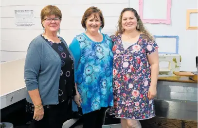  ?? Photo / Nikki Carroll ?? Love Stitch Studio creator Lara von Fintel, right, will be sharing space for her new venture with For Fabric Sake shop owner Berdine Fraenkel, centre, and staff member Carol Hodson.