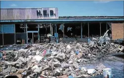  ?? VICTORIA ADVOCATE 1970 ?? Hurricane Celia made landfall in Corpus Christi on Aug. 3, 1970, with winds at 125 mph, killing 11 people, according to the National Weather Service. This view of an H-E-B supermarke­t illustrate­s Celia’s destructiv­e force.