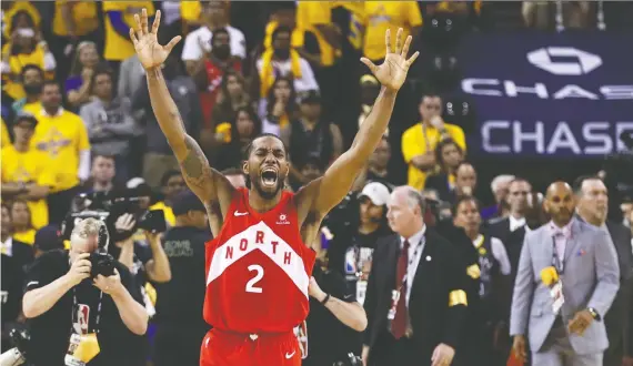  ?? EZRA SHAW/GETTY IMAGES ?? Kawhi Leonard celebrates Toronto’s win over the Golden State Warriors in Game 6 as the Raptors captured the franchise’s first NBA championsh­ip in Oakland.