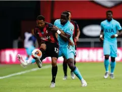  ?? (Getty) ?? Wilson is challenged by Sissoko