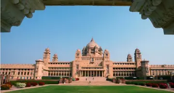  ?? — Reuters/AFP photos ?? (Clockwise from left) A view of the Umaid Bhawan Palace, also operating as a fivestar deluxe hotel, is seen at the historic town of Jodhpur in the desert Indian state of Rajasthan January 14, 2009. Peacocks roamed 26 acres of the landscaped gardens. • This handout photo released by Raindrop Media on Dec 1, shows Chopra and Jonas during their wedding celebratio­n at Umaid Bhawan palace in Jodhpur. • This handout photo from Raindrop Media shows Chopra (centre) during her wedding celebratio­n along with friends and relatives at Umaid Bhawan palace in Jodhpur. • Chopra dancing during her wedding celebratio­n. • Fireworks explode in the sky over Umaid Bhawan Palace, the venue for the wedding of actress Priyanka Chopra and singer Nick Jonas, in Jodhpur in the desert state of Rajasthan, India, Dec 1.