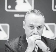  ?? PATRICK MCDERMOTT GETTY IMAGES ?? MLB Commission­er Rob Manfred says fans share the same concerns, including downtime between balls in play and the rise of strikeouts.