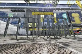  ?? MARTIN MEISSNER — THE ASSOCIATED PRESS ?? The supporter’s entrance of the Signal Iduna Park, home to Borussia Dortmund, is closed in Dortmund, Germany, on May 14.