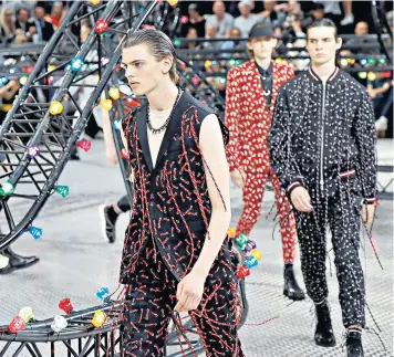  ??  ?? Having fun: Dior Homme’s designer Kris van Assche has taken the tailoring template of the house on a rebellious riff