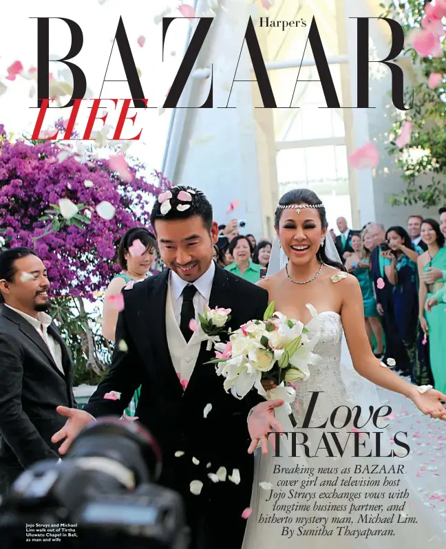  ??  ?? Jojo Struys and Michael Lim walk out of Tirtha Uluwatu Chapel in Bali, as man and wife