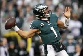  ?? The Associated Press ?? Philadelph­ia Eagles quarterbac­k Jalen Hurts passes during an NFL football game.