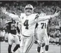  ?? RON JENKINS/AP ?? Cowboys quarterbac­k Dak Prescott now has a playoff win under his belt and the opportunit­y to accomplish even more.