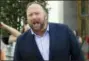  ?? JOSE LUIS MAGANA, FILE - THE AP ?? In this Sept. 5 file photo conspiracy theorist Alex Jones speaks outside of the Dirksen building of Capitol Hill after listening to Facebook COO Sheryl Sandberg and Twitter CEO Jack Dorsey testify before the Senate Intelligen­ce Committee on ‘Foreign Influence Operations and Their Use of Social Media Platforms’ on Capitol Hill in Washington. Twitter is permanentl­y banning rightwing conspiracy theorist Jones and his “Infowars” show for abusive behavior.