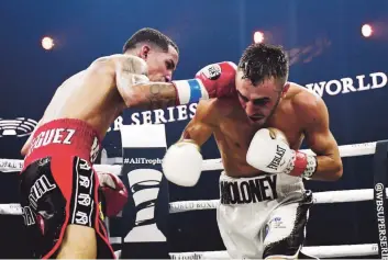  ??  ?? SEMIFINALI­STA. Manny Rodríguez, a la izquierda durante su previa pelea ante James Maloney, enfrentará a Naoya Inoue en una fase semifinal de la World Boxing Super Series de la división gallo.