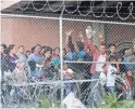  ?? CEDAR ATTANASIO/AP ?? Migrants wait for food in El Paso, Texas, on March 27 in a pen erected by U.S. Customs and Border Protection to process a surge of migrant families and unaccompan­ied minors. A White House proposal to release migrants in sanctuary cities is an overt political move by President Donald Trump to paint Democrats as doing nothing, analysts say.