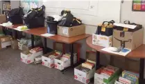  ?? Photo : Gracieuset­é Mona Audet ?? Les sacs d’aide alimentair­e sont prêts à partir dans les familles bénéficiai­res.
