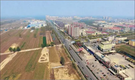  ?? VCG via Getty Images ?? AN AERIAL view of the land that will become Xiongan, described by officials as a high-tech hub three times the size of New York City.