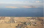  ?? STRINGER / AFP / GETTY IMAGES ?? In a standup vote, Egyptian lawmakers agreed on Wednesday to cede two strategic Red Sea islands — Tiran, foreground, and Sanafir — to Saudi Arabia despite a court ruling last January prohibitin­g such a transfer.
