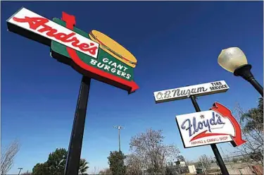  ?? PHOTOS BY ALEX HORVATH / THE CALIFORNIA­N ?? Early last year, the Kern County Museum’s neon sign collection consisted of eight or nine signs. One year later, the collection stands at 22. “We have three signs left to restore and hang in the next couple of weeks,” said museum Director Mike McCoy. He called the Andre’s sign “a monster” for its size and weight.