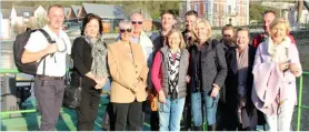  ??  ?? BELOW: The Aussie team soak up the morning sun with Uniworld ceo Ellen Bettridge before heading to the city of Honfleur.