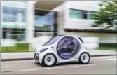  ?? PROVIDED TO CHINA DAILY ?? Daimler shows off its all-new Smart Vision EQ ForTwo. The twoseater features a full suite of technologi­es purpose-designed for autonomous car-sharing.