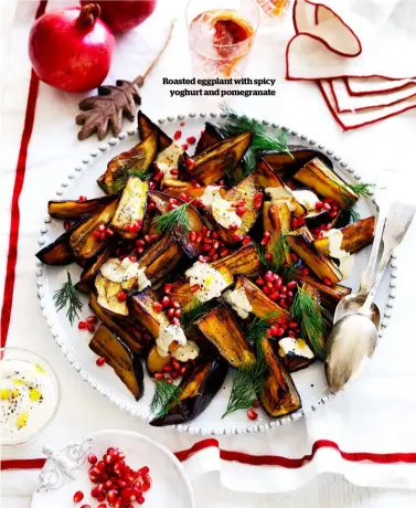  ??  ?? Roasted eggplant with spicy yoghurt and pomegranat­e