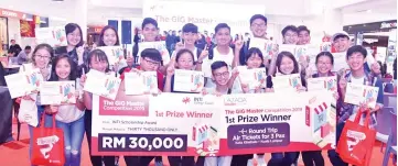  ??  ?? The champion of the GIG Master 2019 Competitio­n, Team G4M5, from Sabah Tshung Tsin Secondary School, along with their school mates.