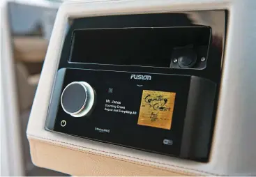  ??  ?? Left: The Fusion Apollo RA770 four-zone, touch-screen-controlled head unit has Bluetooth and Wi-Fi capabiliti­es.