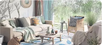  ?? ?? George Green Embroidere­d Cushion, (second to right), Green Check Throw, (hanging on hook), Green Riverside Cottage Print Throw, (draped on sofa), Green Textured Vase, Natural Woven Wood Basket, rest of items from a selection, Direct.asda