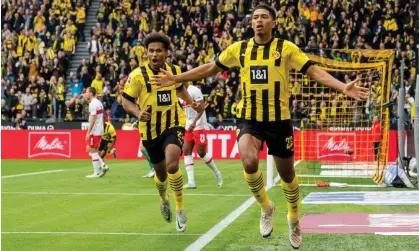  ?? ?? Jude Bellingham cheers after scoring for Borussia Dortmund against Stuttgart. Photograph: Alexandre Simões/Borussia Dortmund/Getty Images