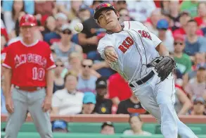  ?? STAFF PHOTO BY MATT WEST ?? ON THE MARK: Red Sox third baseman Tzu-Wei Lin throws on the run to get Albert Pujols out in the eighth inning of yesterday’s 4-2 loss.