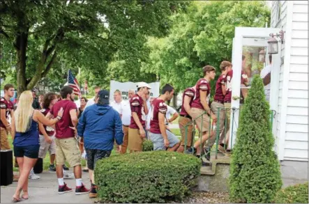  ?? CHARLES PRITCHARD - ONEIDA DAILY DISPATCH ?? Members of Coby Stevens’s football team attend his wake at Campbell Dean Funeral Home in Canastota on Tuesday, Aug. 28, 2018.