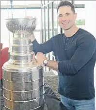  ?? JASON MALLOY/THE GUARDIAN ?? Andy O’Brien brought the Stanley Cup to Charlottet­own in August after the Pittsburgh Penguins won the NHL championsh­ip over the San Jose Sharks. The Penguins repeated on Sunday night.