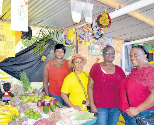  ?? FILE ?? Members of the JAS Perth Town Farmers Group in Trelawny display their produce at the Hague Agricultur­al Show 2019.