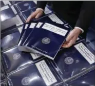  ?? PABLO MARTINEZ MONSIVAIS — ASSOCIATED PRESS ?? Copies of President Donald Trump’s fiscal 2018 federal budget are seen on Capitol Hill in Washington last month.