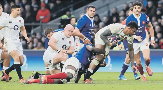  ??  ?? England’s Courtney Lawes (centre) in action during the Guinness Six Nations match against France.