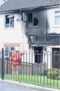  ??  ?? ●●The scene of the fire at Kirklee Road Castleton