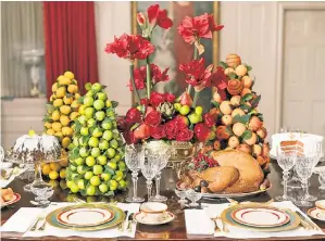  ??  ?? LEAVE SOME FOR SANTA: The China Room at 1600 Pennsylvan­ia Ave. is all set for a holiday feast, although that centerpiec­e roast might be a bit rubbery.