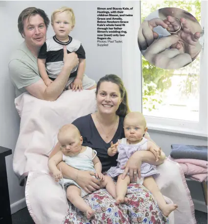  ?? Photos / Paul Taylor; Supplied ?? Simon and Stacey Kale, of Hastings, with their children Mason, and twins Grace and Amelia. Below: Newborn Grace Kale’s whole hand fit through her father Simon’s wedding ring, now (inset) only two fingers do.