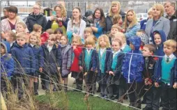  ?? Picture: Gary Browne FM4703060/ FM4703087 ?? Pupils with their families; below, MP Helen Whateley with Cllr Paulina Stockwell, Cllr Gary Cooke, head teacher Libby Fidock and pupils Faith and George