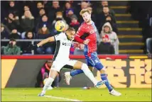  ?? ?? Chelsea’s Christophe­r Nkunku and Crystal Palace’s Joachim Andersen (right), vie for the ball, during the English Premier League soccer match between Crystal Palace and Chelsea, at Selhurst Park, in London. (AP)