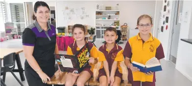  ?? ?? Hermit Park State School’s Out of School Hours Care service manager Jade Lucas with Peyton Lucas, 8, Spencer Lucas, 5, and Alex Matters, 12. Picture: Evan Morgan
