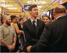  ?? Joe Raedle / Getty Images ?? Democratic candidate Jon Ossoff nearly pulled off the victory outright on the heels of a huge fundraisin­g effort.