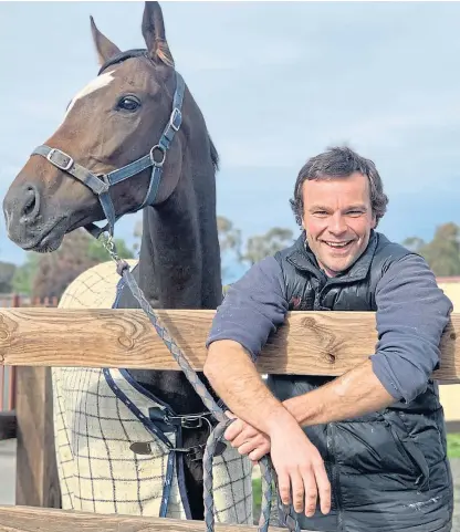  ??  ?? Dr Mike Whiteford with one of the horses at the equine hospital he bought in 2012 and, below, with Dr Chris Allison from Stirling who runs a nearby practice for smaller animals such as koalas.