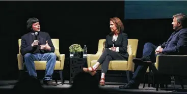  ?? Houston Public Media ?? Documentar­y filmmakers Ken Burns, left, and Lynn Novick discuss “The Vietnam War,” a forthcomin­g 18-hour documentar­y for PBS, with Houston Public Media’s Ernie Manouse at the University of Houston.