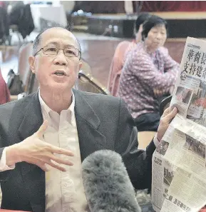  ?? PHOTOS: NICK PROCAYLO ?? Eric Szeto, an advocate for seniors and cultural issues in Chinatown, speaks to the media about the proposed 12-storey project at 105 Keefer St. on Sunday.