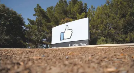  ?? — AFP ?? The Facebook ‘like’ sign is seen at Facebook’s corporate headquarte­rs campus in Menlo Park, California.