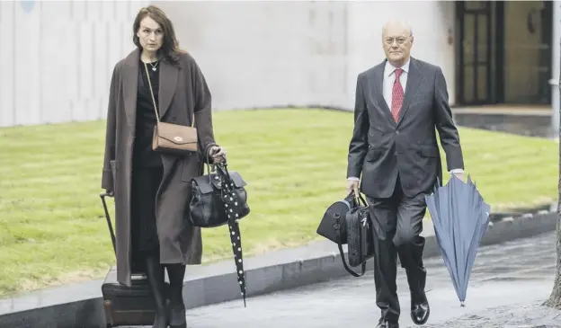  ?? PICTURE: PETER BYRNE/PA ?? Sir John Saunders, chair of the inquiry, and Sophie Cartwright, deputy counsel, arrive for the start of the Manchester Arena bombing public inquiry