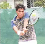  ?? SRENG MENG SRUN ?? Diego Garcia Dalisay of the Philippine­s plays a shot in the Tep Khunnah Memorial Cup final on Saturday.