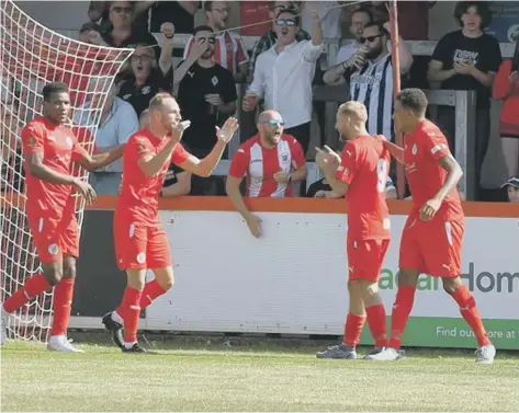  ?? ?? Callum Stead celebrates after scoring Brackley’s first goal. Picture: Peter Keen